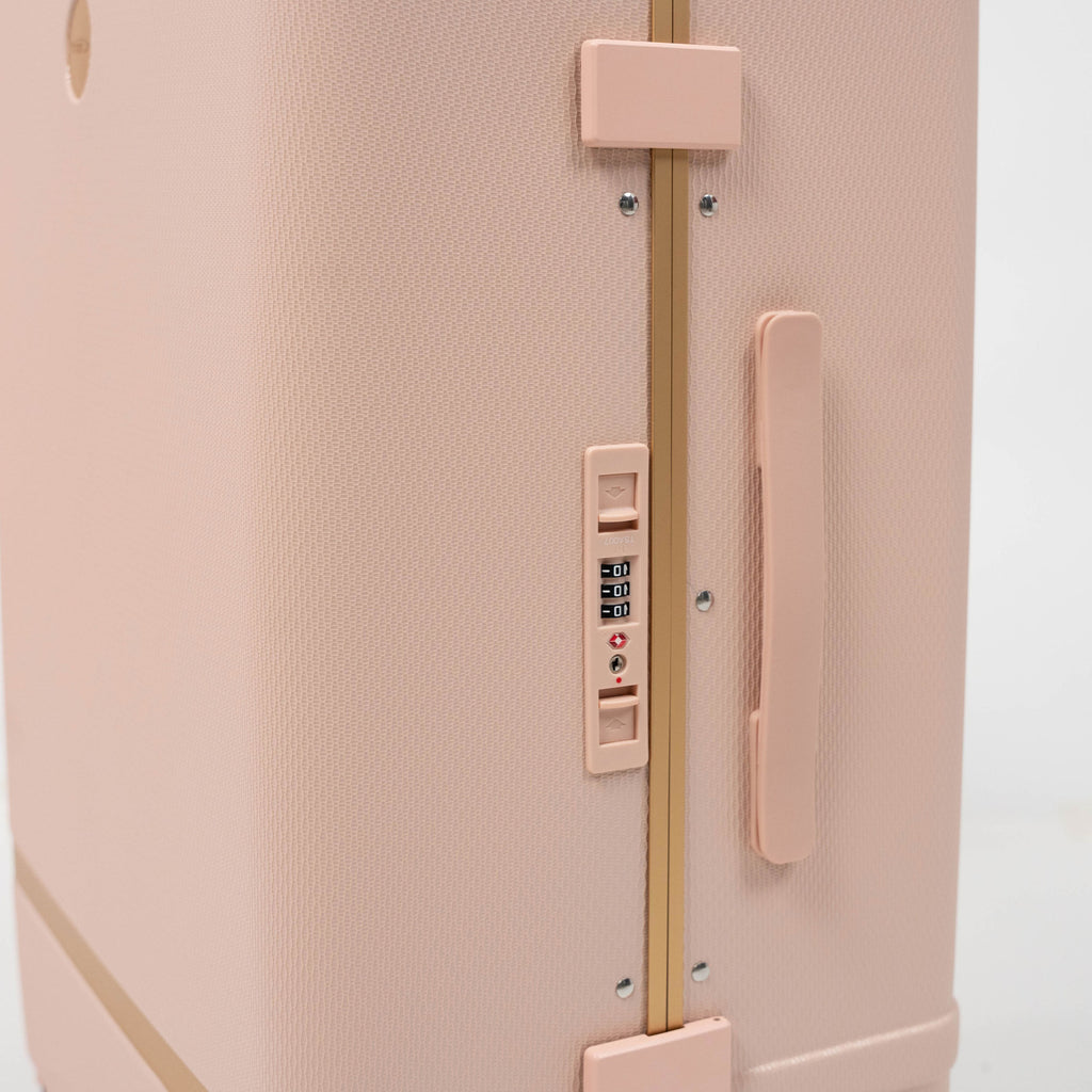 Serrure à combinaison TSA007 rose et dorée sur valise rigide Titou